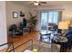 Bright living room with hardwood floors and access to balcony at 5925 Todd St # D-21, Bradenton, FL 34207