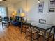 Bright living room with hardwood floors and dining area at 5925 Todd St # D-21, Bradenton, FL 34207
