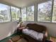 Sunroom with wicker seating and large windows providing ample natural light at 5925 Todd St # D-21, Bradenton, FL 34207