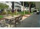 Community patio with seating for outdoor relaxation and entertaining at 5925 Todd St # D-21, Bradenton, FL 34207