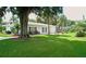 Charming single-story home with a spacious lawn and mature trees at 5925 Todd St # D-21, Bradenton, FL 34207