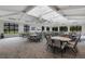 Large community dining area with multiple tables and chairs at 14480 Eagle Branch Dr, Nokomis, FL 34275