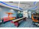 Well-equipped game room with various arcade games at 14480 Eagle Branch Dr, Nokomis, FL 34275