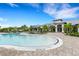Large resort-style pool with a shallow area and plenty of seating at 14480 Eagle Branch Dr, Nokomis, FL 34275