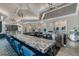 Upscale community bar with granite countertop and stainless steel appliances at 14480 Eagle Branch Dr, Nokomis, FL 34275