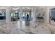 Lobby with marble floors and comfortable seating at 14480 Eagle Branch Dr, Nokomis, FL 34275
