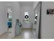 Bright entryway with mirror, console table, and view to bedroom at 14480 Eagle Branch Dr, Nokomis, FL 34275