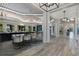 Elegant community room boasts high ceilings, modern lighting, and comfortable seating areas at 14480 Eagle Branch Dr, Nokomis, FL 34275