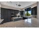Well-equipped community kitchen with dark cabinetry and granite counters at 14480 Eagle Branch Dr, Nokomis, FL 34275