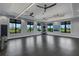 Spacious yoga studio with hardwood floors and large windows at 14480 Eagle Branch Dr, Nokomis, FL 34275