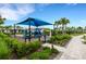 playground with shade structure and play equipment at 14480 Eagle Branch Dr, Nokomis, FL 34275