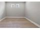 Spacious bedroom with hardwood floors and neutral walls at 3118 Tramonto Ct, Bradenton, FL 34211