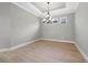 Bright dining room with chandelier and hardwood floors at 3118 Tramonto Ct, Bradenton, FL 34211