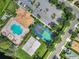 Community pool, sports courts, and parking at 811 Fairway Cove Ln # 205, Bradenton, FL 34212