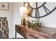 Charming console table featuring modern lamp, decorative clock, and contemporary design elements at 5306 19Th W Ave, Bradenton, FL 34209