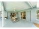 Covered patio with dining set and sliding glass doors, perfect for outdoor entertaining at 5306 19Th W Ave, Bradenton, FL 34209
