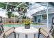 Inviting screened pool with outdoor seating and manicured landscaping, perfect for relaxation at 5306 19Th W Ave, Bradenton, FL 34209