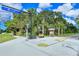 Well-marked trail intersection with benches and informational kiosk at 220 Capriana Ct, Nokomis, FL 34275