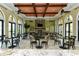 Relaxing clubhouse lounge with fireplace and seating at 220 Capriana Ct, Nokomis, FL 34275