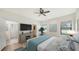Main bedroom with walk-in closet and access to bathroom at 220 Capriana Ct, Nokomis, FL 34275