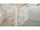 Office with French doors and view of hallway at 220 Capriana Ct, Nokomis, FL 34275
