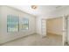 Spacious office with two windows and French doors at 220 Capriana Ct, Nokomis, FL 34275