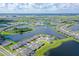 Luxury community with many houses, lakes and resort-style amenities at 9018 Sunray Cv, Parrish, FL 34219