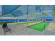 Outdoor bocce ball courts with shaded seating at 9018 Sunray Cv, Parrish, FL 34219