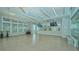 Bright yoga studio with wood floors and large windows at 9018 Sunray Cv, Parrish, FL 34219