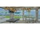 Community game room with pool table and lake view at 9018 Sunray Cv, Parrish, FL 34219