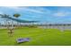 Outdoor lawn games area with cornhole at 9018 Sunray Cv, Parrish, FL 34219