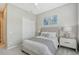 Cozy bedroom with a full-size bed and ample closet space at 9018 Sunray Cv, Parrish, FL 34219