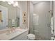 Modern bathroom with a walk-in shower and updated vanity at 9018 Sunray Cv, Parrish, FL 34219