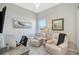 Home office with comfortable seating and natural light at 9018 Sunray Cv, Parrish, FL 34219