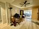 Living room with couch, coffee table, and sliding glass doors at 361 Porpoise Rd, Venice, FL 34293