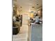 View of kitchen with light wood cabinets and flooring at 361 Porpoise Rd, Venice, FL 34293