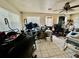 Living room filled with various items and furniture at 361 Porpoise Rd, Venice, FL 34293