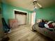 Bedroom with light flooring and a walk-in closet at 361 Porpoise Rd, Venice, FL 34293