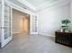 Bright office space with glass French doors and wood-look tile flooring at 341 Villoresi Blvd, Nokomis, FL 34275