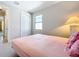 Comfortable bedroom with a full-size bed, and closet at 341 Villoresi Blvd, Nokomis, FL 34275