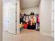 Large walk-in closet with ample shelving and hanging space at 341 Villoresi Blvd, Nokomis, FL 34275