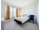 Cozy bedroom with a full-size bed and neutral decor at 341 Villoresi Blvd, Nokomis, FL 34275