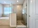 Clean bathroom with a walk-in shower and tiled flooring at 341 Villoresi Blvd, Nokomis, FL 34275