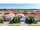Community view showing many homes with red tile roofs at 341 Villoresi Blvd, Nokomis, FL 34275