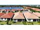 Community overview featuring lake and houses at 341 Villoresi Blvd, Nokomis, FL 34275