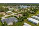 Aerial view showing home's location and pool at 8993 Bantry Bay Blvd, Englewood, FL 34224