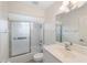 Clean bathroom with tub, shower, and vanity at 8993 Bantry Bay Blvd, Englewood, FL 34224