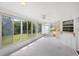 Sunroom with sliding doors and backyard view at 8993 Bantry Bay Blvd, Englewood, FL 34224