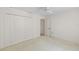 Bright bedroom with ample closet space and neutral carpeting at 8993 Bantry Bay Blvd, Englewood, FL 34224