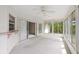 Bright sunroom with sliding glass doors at 8993 Bantry Bay Blvd, Englewood, FL 34224
